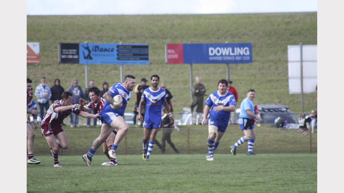 Action in the Paterson River (blue colours) v Morisset game. Photos by Charles Elias