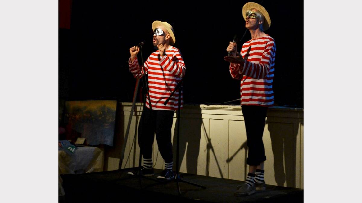 Gondoliers Of Love launching into their famous “Dungog, Dungog” from West Side Story at the Dungog Masked Ball