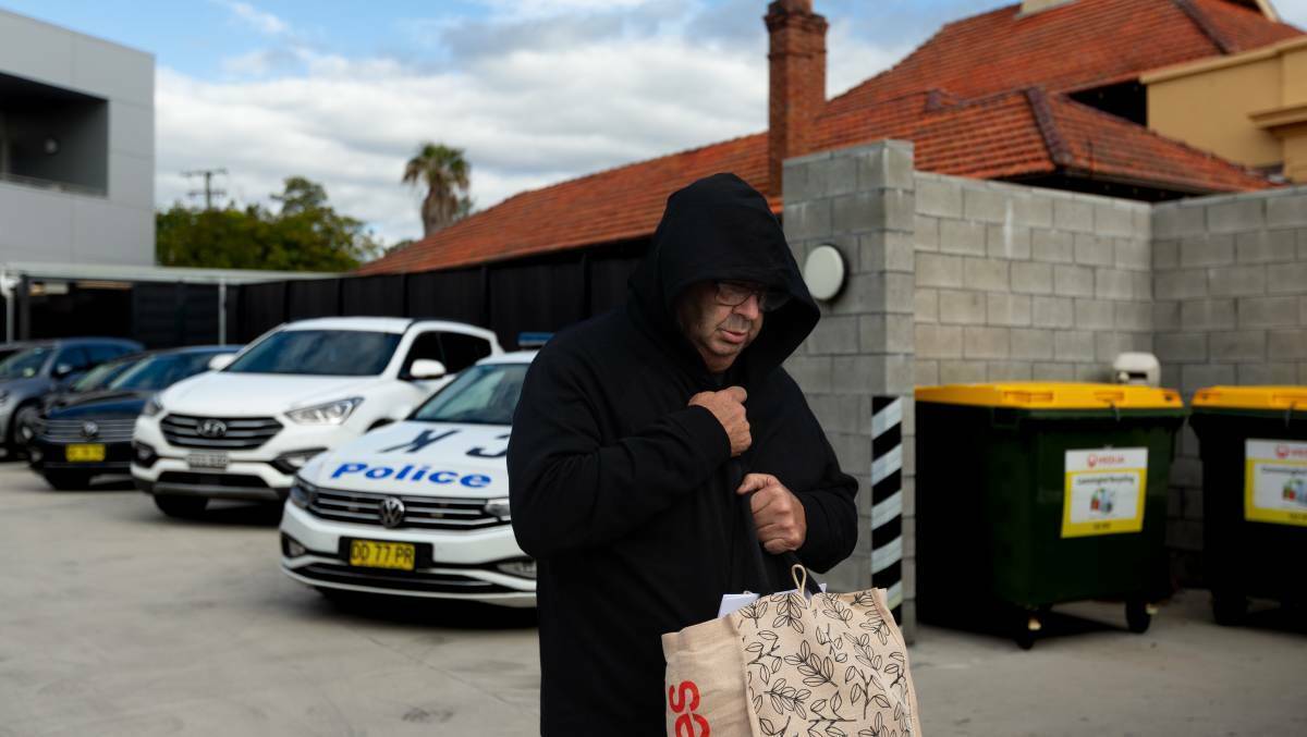 Brett Button leaves Cessnock police station after he was granted bail in June. He has been charged with 10 counts of dangerous driving occasioning death. 