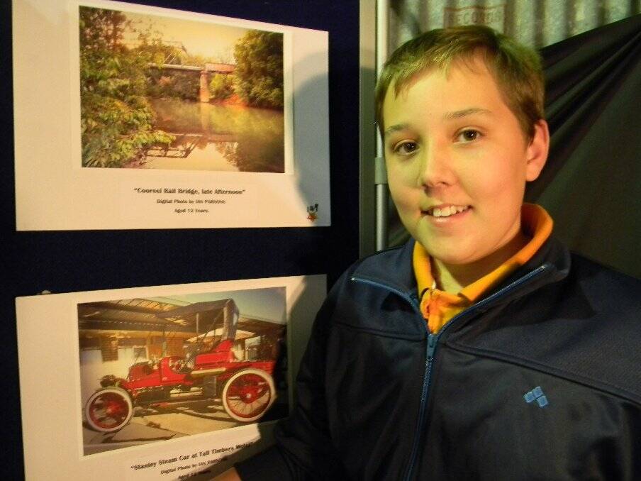 Student Ian Parsons with two of his photographic entries
